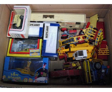 A collection of modern release vintage and associated diecasts and accessories, mainly farm and construction related, to incl