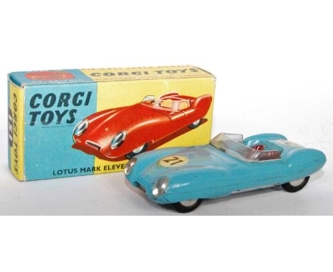 A Corgi Toys No. 151 Lotus Mk11 Le Mans race car finished in turquoise blue with red interior and spun hubs, model has been r