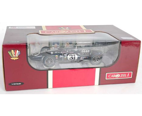 A Carousel 1 No. 4763 1/18 scale model of an AAR Eagle 1966 Indy 500 race car with All American livery, racing No. 31, as dri