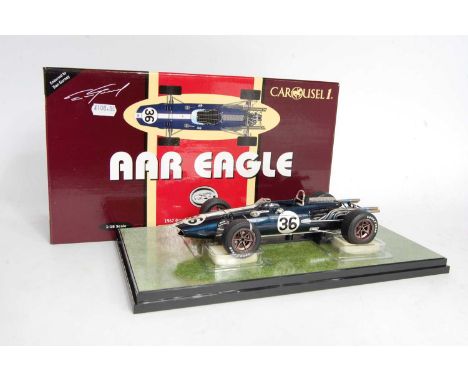 A Carousel 1 1/18 scale model of a No. 4751 AAR Eagle 1967 Grand Prix of Belgium Spa winner, comprising of dark blue body wit