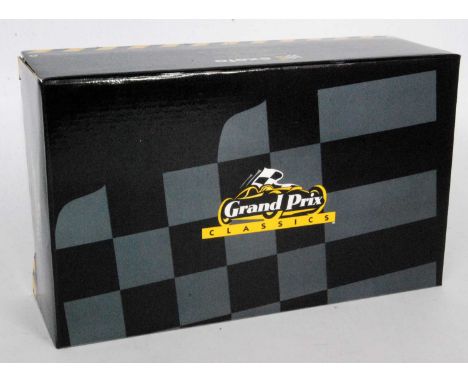 An Exoto Grand Prix Classics 1/18 scale model of a Jim Clark Lotus Ford type 49 race car comprising green and yellow body wit
