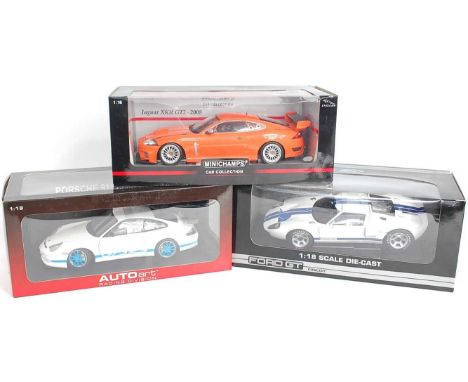 An Auto Art, Minichamps, and Bean Stalk 1/18 scale boxed racing car diecast group to include an Auto Art Racing Division Pors