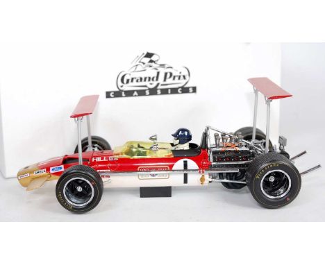 An Exoto Grand Prix Classics 1/18 scale model of a Graham Hill Lotus Ford type 49B F1 race car comprising of red, white and g