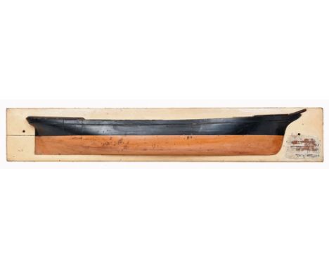 A BUILDER'S HALF BLOCK MODEL FOR A BARQUE OR CLIPPER, UNIDENTIFIED, CIRCA 1870
the laminated carved hull finished 'copper' be