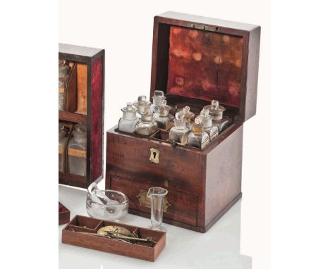 A SMALL 19TH-CENTURY TRAVELLING MEDICINE CHEST
the top with compartments for 12 bottles in three sizes, most with contents an