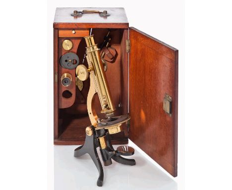 A LATE 19TH-CENTURY MONOCULAR MICROSCOPE BY ARONSBERG & SON, MANCHESTER
with lacquered brass barrel and support and oxidised 