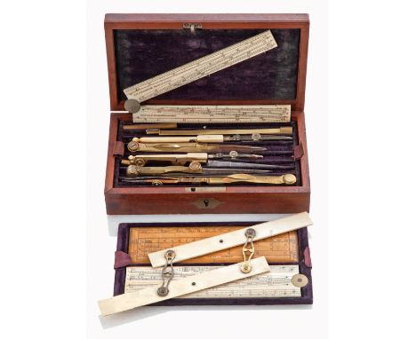 Ø A LATE 19TH-CENTURY DRAWING SET BY ELLIOTT BROTHERS, LONDON
the top tray complete with compass, pens, dividers etc, the mid