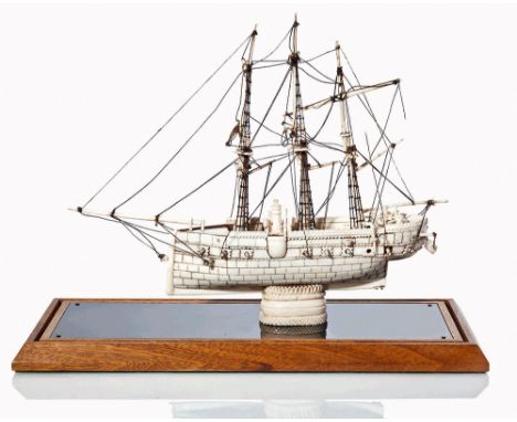 A STYLISED BONE MODEL OF A MAN O'WAR, POSSIBLY PORTUGUESE, CIRCA 1860
depicting a ram-bowed battleship with simple fittings i