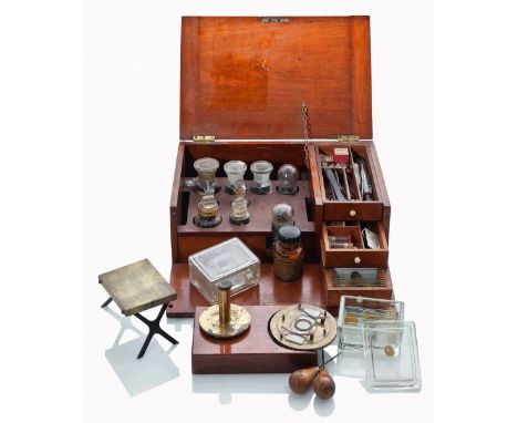 A LATE 19TH-CENTURY MICROSCOPE SLIDE PREPARATION SET
unsigned, with drop-down front revealing fitted compartments and drawers
