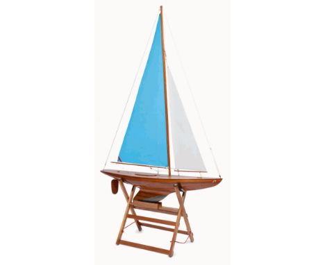 A WELL-BUILT RADIO-CONTROLLED SAILING MODEL OF THE MARBLEHEAD CLASS POND YACHT POCAHONTAS
modelled by R. Foster, the planked 