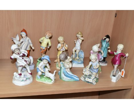 ELEVEN ROYAL WORCESTER MONTHS OF THE YEAR FIGURES MODELLED BY FREDA DOUGHTY, comprising 'January' 3452 (small hairline on bac