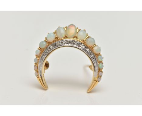 AN 18CT GOLD OPAL AND DIAMOND CRESCENT BROOCH, set with a row of graduated oval and circular cut opal cabochons, and a row of
