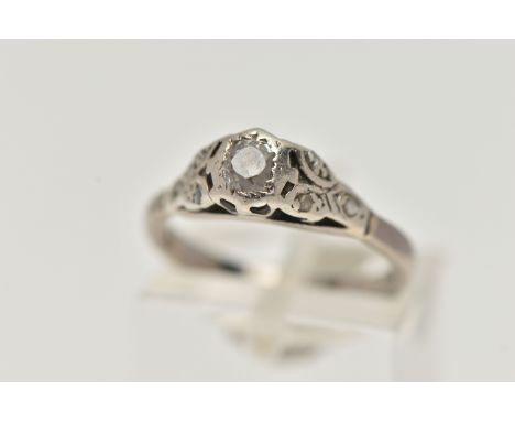 A WHITE METAL SINGLE STONE DIAMOND RING, set with an old cut diamond, estimated diamond weight 0.25cts, in a raised setting, 