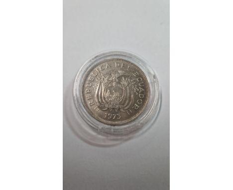 AN ECUADOR DOS SUCRES 1973 COIN, in a capsule and plastic sleeve, Numista states The recorded mintage is 2 million pcs., but 