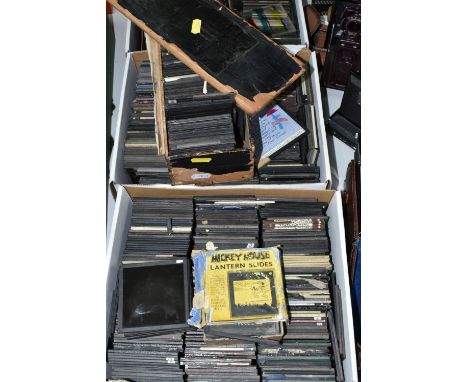 FOUR BOXES CONTAINING A LARGE QUANTITY OF MAGIC LANTERN SLIDES approximately 650 mostly of landscapes, external and internal 