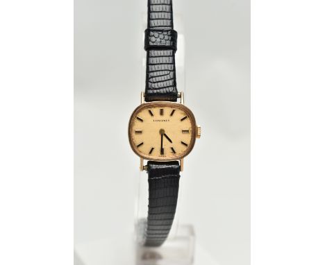 A LADYS 9CT GOLD 'LONGINES' WRISTWATCH, manual wind, rounded rectangular dial signed 'Longines', baton markers, black hands, 