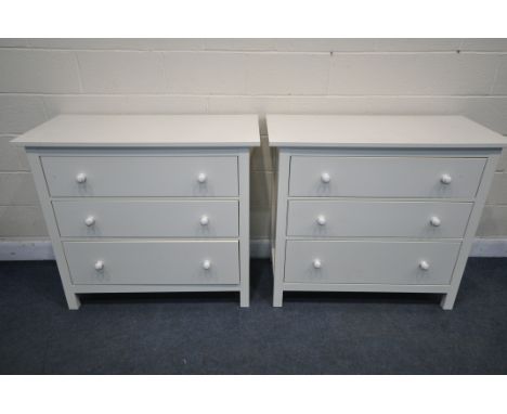 A PAIR OF WHITE FINISH IKEA CHEST OF THREE LONG DRAWERS, with white handles, width 110cm x depth 51cm x height 97cm (conditio
