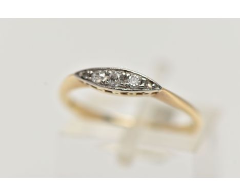 A YELLOW METAL DIAMOND BOAT RING, set with three graduated old cut diamonds and two rose cut diamonds, in a milgrain collet s