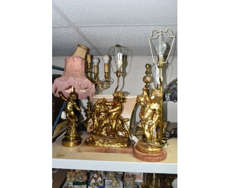 SIX FIGURAL TABLE LAMPS, to include a table lamp cast with two putti on a marble plinth, height to top of bulb fitting approx