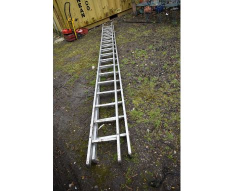 AN ALUMINIUM DOUBLE EXTENSION LADDER with 17 rungs to each 450cm long sections