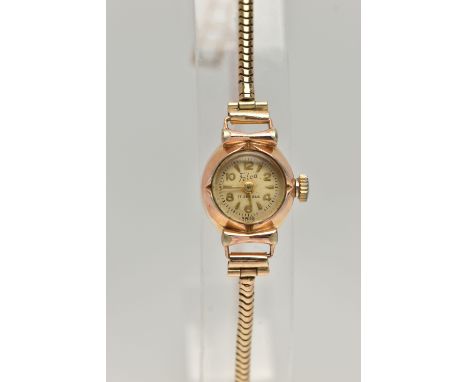A LADYS 'FELCA' WRISTWATCH, manual wind watch featuring a round gold dial signed 'Felca', alternating Arabic numerals and bat