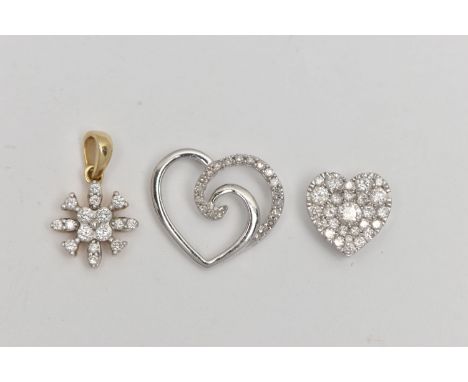 THREE DIAMOND SET PENDANTS, the first a 9ct white gold diamond set heart pendant, hallmarked 9ct London, a 9ct white gold ope