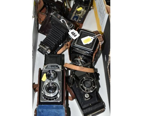 TWO VINTAGE TLR CAMERAS AND FOUR FOLDING CAMERAS comprising of a Minolta Autocord with Rokkor 75mm f3.2 and f3.5 lens, a Flex