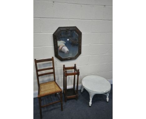 AN EARLY TO MID 20TH CENTURY OAK FRAMED WALL MIRROR, an oak stick stand, height 72cm, a Lloyd loom circular coffee table, and