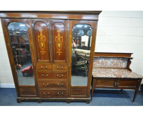 AN EDWARDIAN MAHOGANY AND INLAID THREE PIECE BEDROOM SUITE, comprising a compactum wardrobe, with an arrangement of drawers a