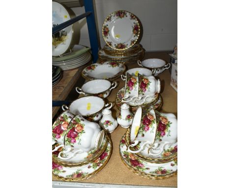 ROYAL ALBERT 'OLD COUNTRY ROSES' PART DINNER SERVICE, comprising six cups and saucers, seven cake plates, four twin handled s