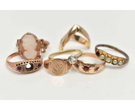 SEVEN RINGS, to include a double wishbone ring, a cameo ring, a small oval signet ring with engraved monogram, a three stone 