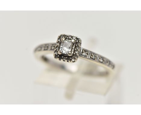 A 9CT WHITE GOLD DIAMOND CLUSTER RING, square head set with an emerald cut diamond, in a surround of single cut diamonds to t