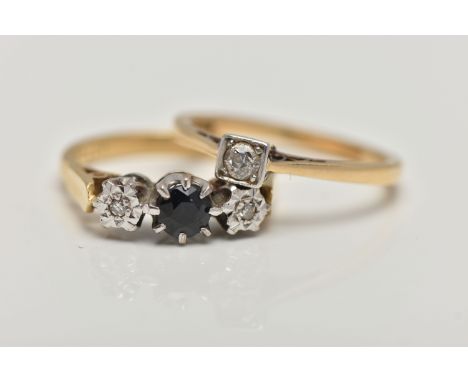 TWO RINGS, to include an 18ct gold three stone ring, set with a central circular cut deep blue sapphire, flanked with  illusi