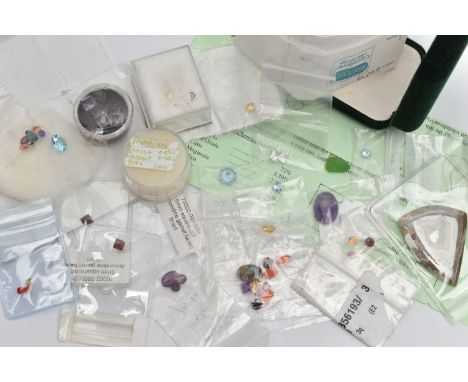A SELECTION OF FACETED LOOSE GEMSTONES, to include various cut garnets, amethyst, quartz, an oval labradorite cabochon, three