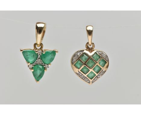 TWO 9CT GOLD, EMERALD AND DIAMOND PENDANTS, the first a heart shape pendant set with eight square cut emeralds with single cu