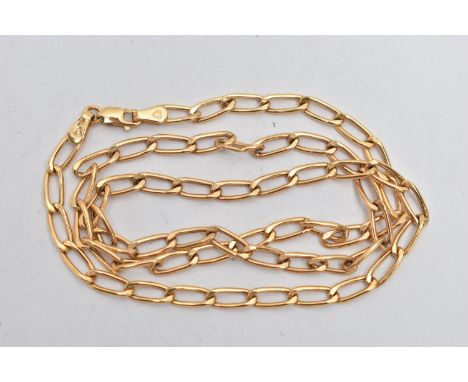 A 9CT GOLD CURB LINK CHAIN, elongated links, fitted with a lobster clasp, hallmarked 9ct Sheffield import, length 440mm, appr