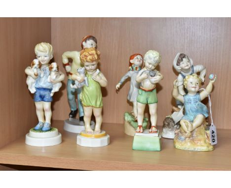 A SET OF SEVEN ROYAL WORCESTER BOY DAYS OF THE WEEK FIGURES, comprising Monday 3519, Tuesday 3534, Wednesday 3521, Thursday 3