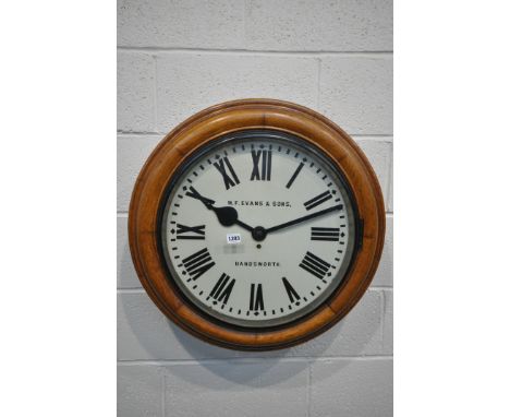 WILLIAM FREDERICK EVANS OF BIRMINGHAM, A LATE 19TH / EARLY 20TH CENTURY CIRCULAR OAK CASED SINGLE FUSEE WALL CLOCK, the ename