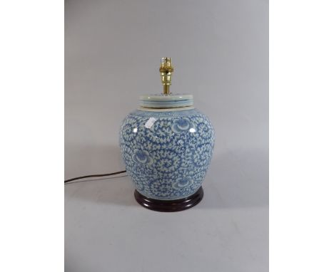 An Oriental Lidded Blue and White Vase Converted to Table Lamp, Circular Wooden Base, 32 Cm High