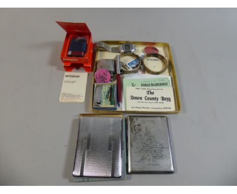 A Collection of Curios to Include Isle of Man Ferry Lighter, Cigarette Cases, Vintage Digital Wrist Watch, Badges Etc