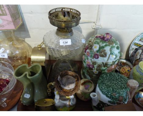 A Tray Containing Brass Based Oil Lamp with Glass Reservoir, The Village Teapot and Biscuit Barrel, Bird Ornaments Etc