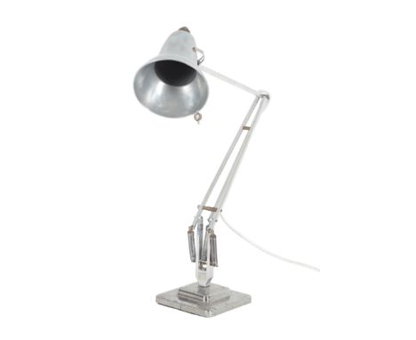 A CHROMED METAL ANGLEPOISE DESK LAMP stamped 'By Herbert Terry & Sons', on a plinth base, approx. 91cm high when extendedProv