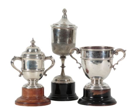 A SILVER GOLFING TROPHY CUP AND COVER The 'Louisan' Golf Cup, A & J Zimmerman Ltd, Birmingham, 1922, (c. 144g), on a turned a