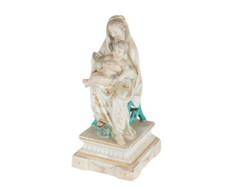 AN 18TH CENTURY DUESBURY & CO DERBY PORCELAIN FIGURE - MADONNA & CHILD modelled seated in a turquoise chair, on square plinth