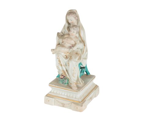 AN 18TH CENTURY DUESBURY & CO DERBY PORCELAIN FIGURE - MADONNA & CHILD modelled seated in a turquoise chair, on square plinth