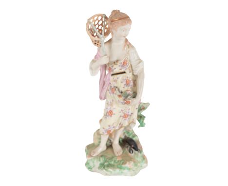 AN 18TH CENTURY DUESBURY &amp; CO DERBY PORCELAIN FIGURE - FISHER GIRL modelled wearing floral dress and holding net aloft, t