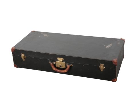 LOUIS VUITTON: A BLACK CAR TRUNK with leather mounts, the brass lock inscribed "LOUIS VUITTON PARIS LONDON", the side clips a