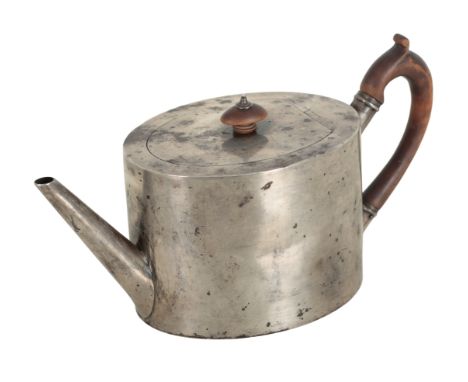 A VICTORIAN SILVER TEAPOT BY CHARLES STUART HARRIS London, 1883, with turned wood finial and moulded handle, with an engraved