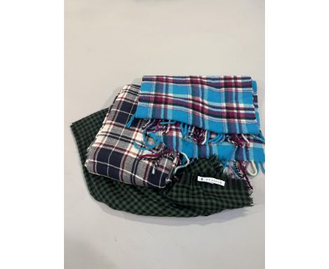 A group of cashmere accessories to include a Begg &amp; Co. dark green/black check scarf in lightweight cashmere (200cm x 70c