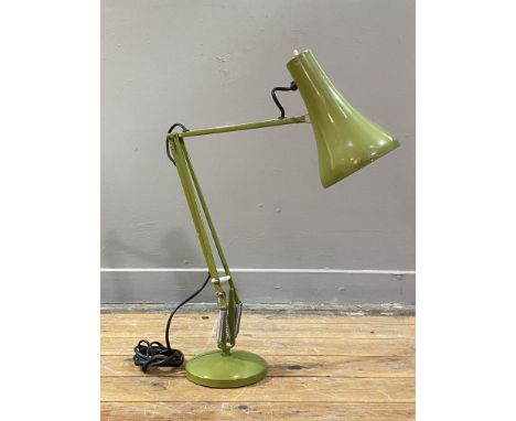 Herbert Terry &amp; Sons, a vintage anglepoise lamp, with conical shade and circular base finished in pea green. H80cm.